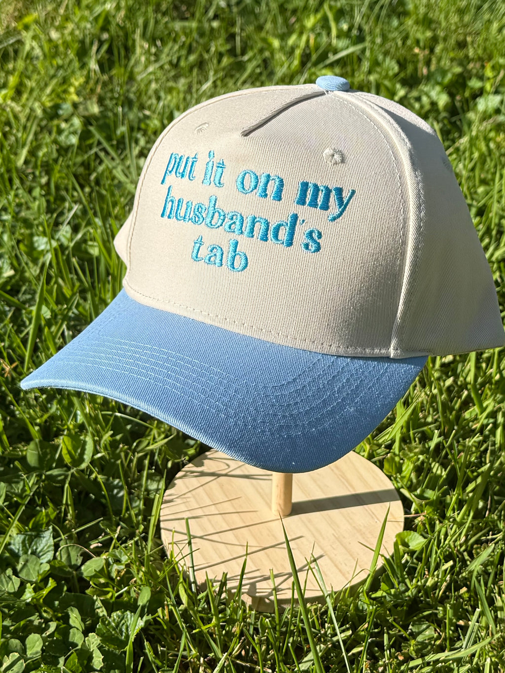 Put it on my husbands tab Trucker Hat