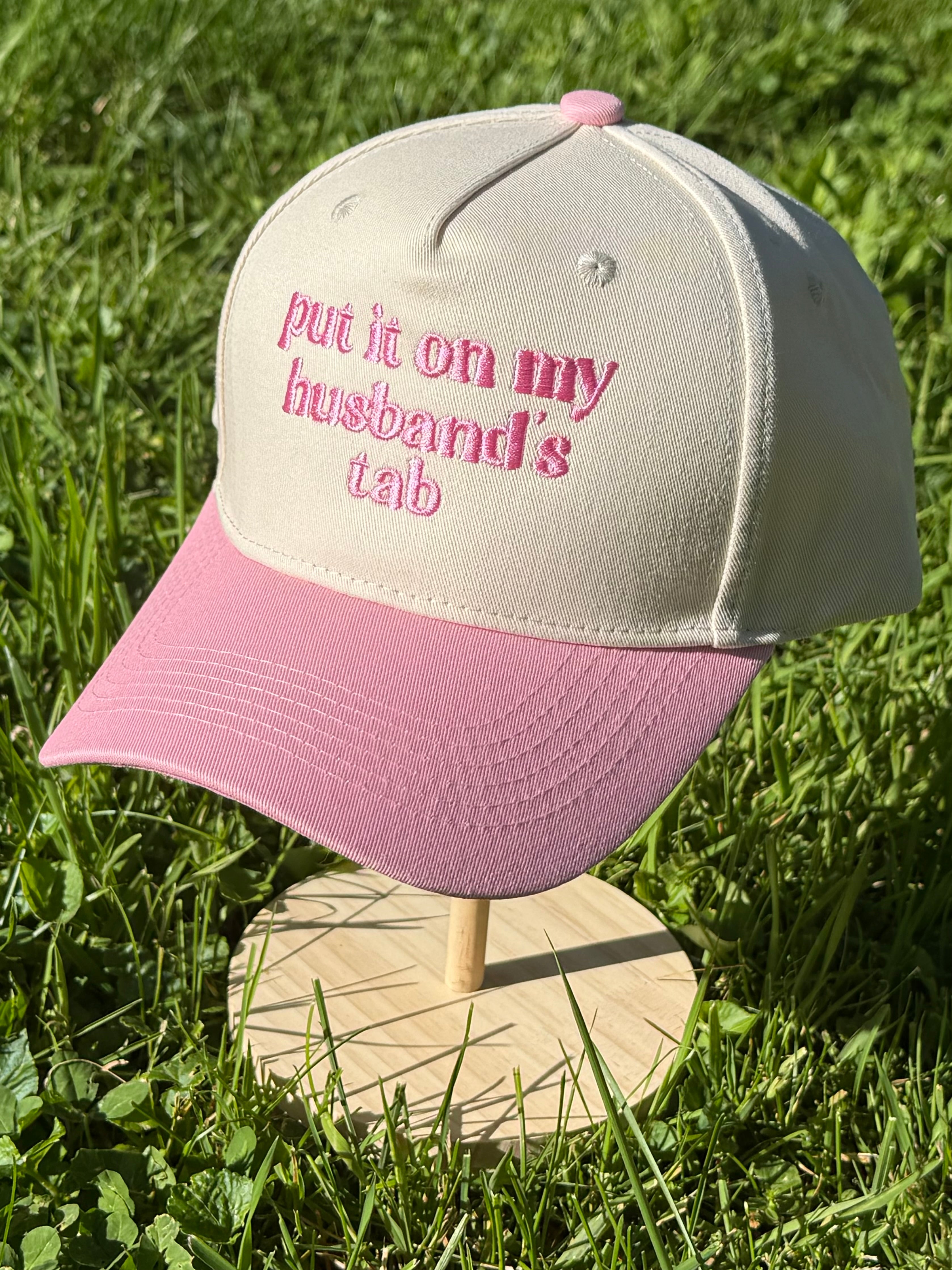 Put it on my husbands tab Trucker Hat