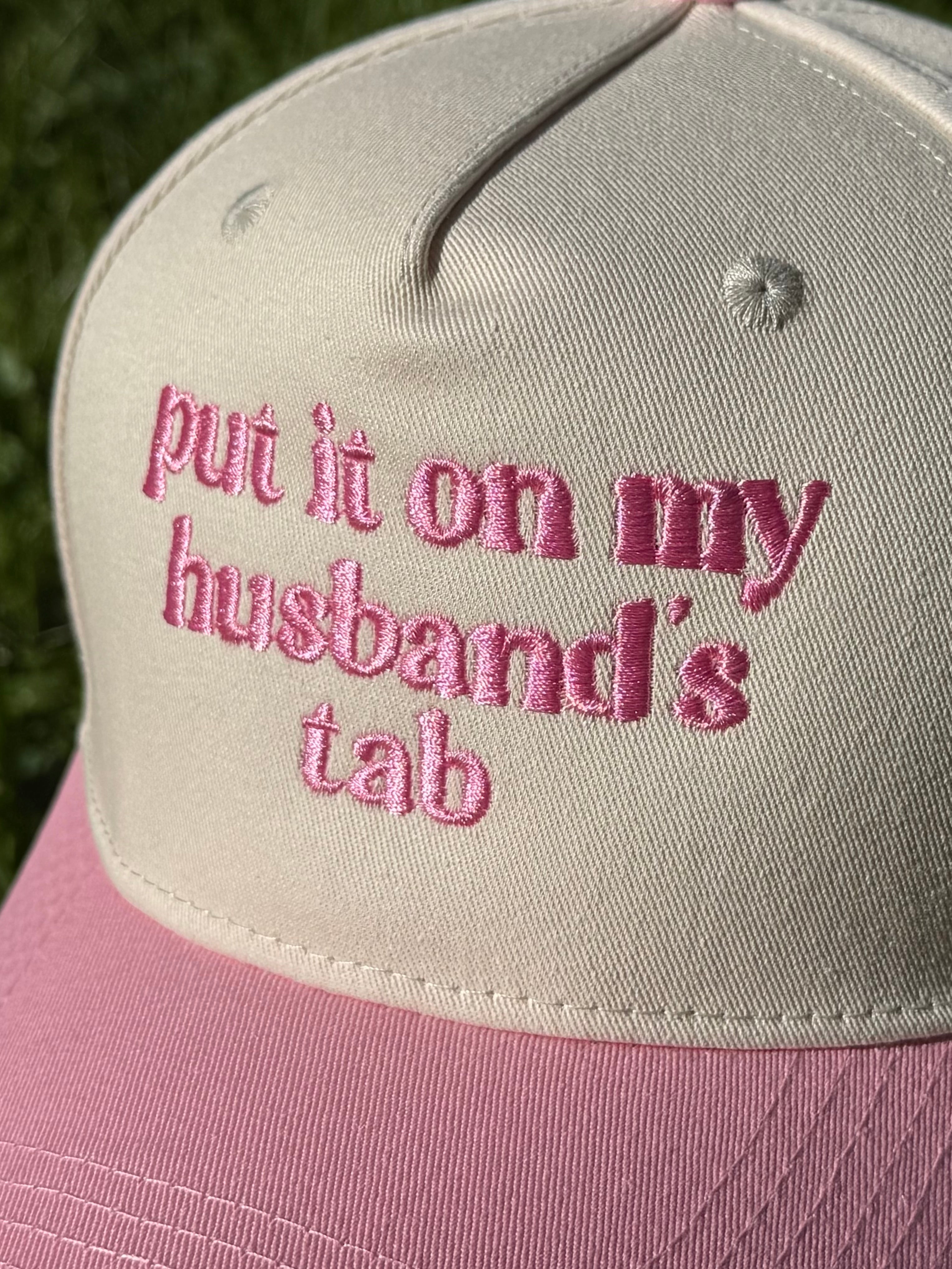 Put it on my husbands tab Trucker Hat